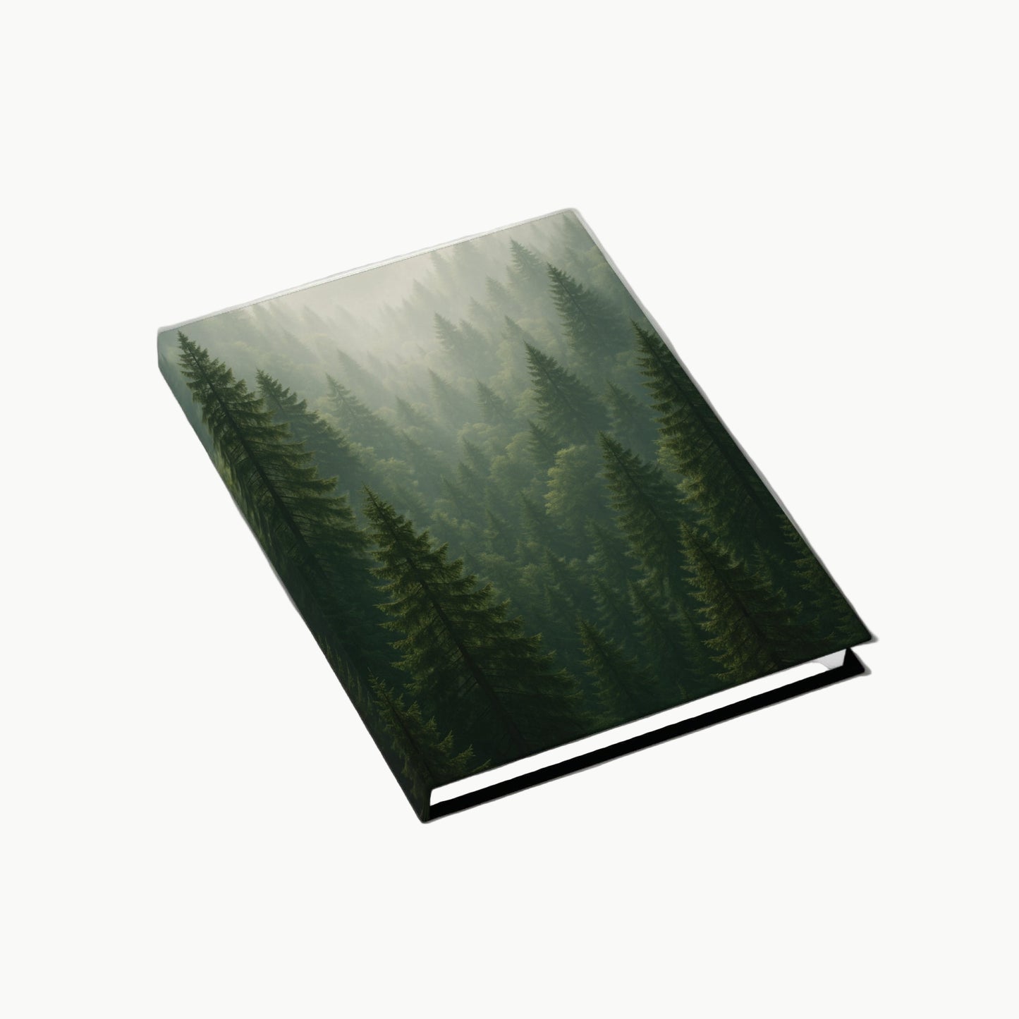 Book with a cover featuring a forest design on a white background