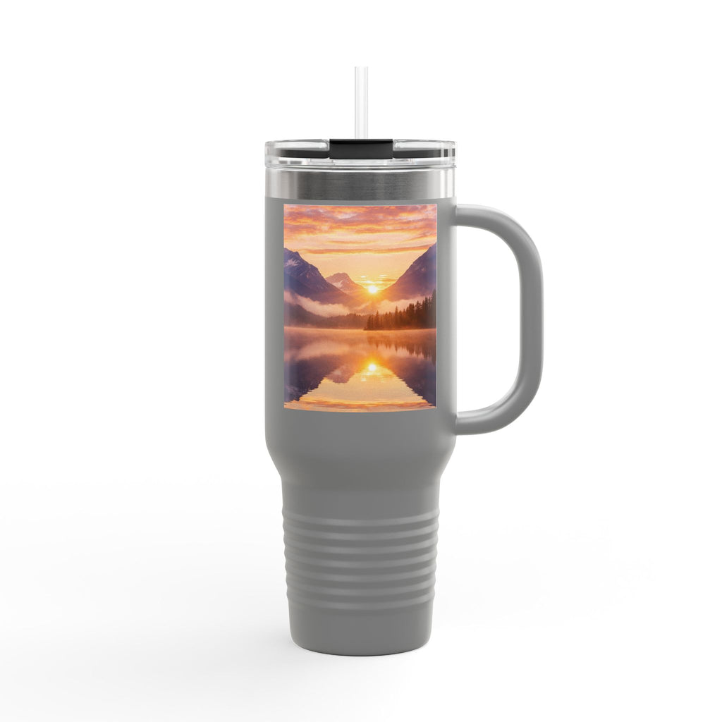 Gray travel mug with a mountain sunset design on a white background