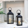 Set of 2 decorative candle lanterns with nature-inspired artwork