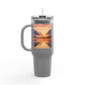 Gray insulated mug with a scenic sunset design on a white background