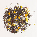 Organic Turmeric Ginger Peach herbal teas with nature-inspired artwork