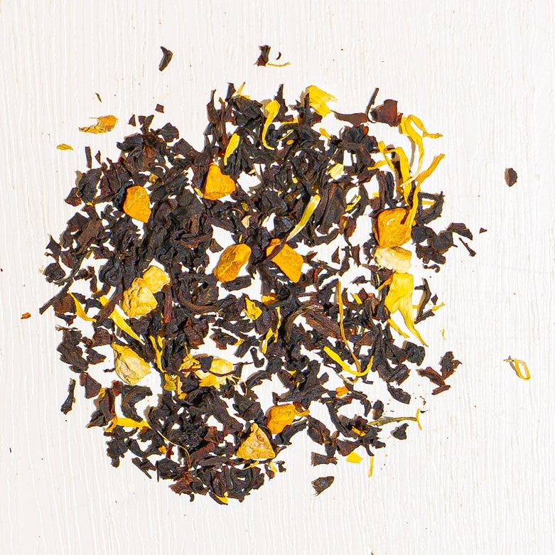 Organic Turmeric Ginger Peach herbal teas with nature-inspired artwork