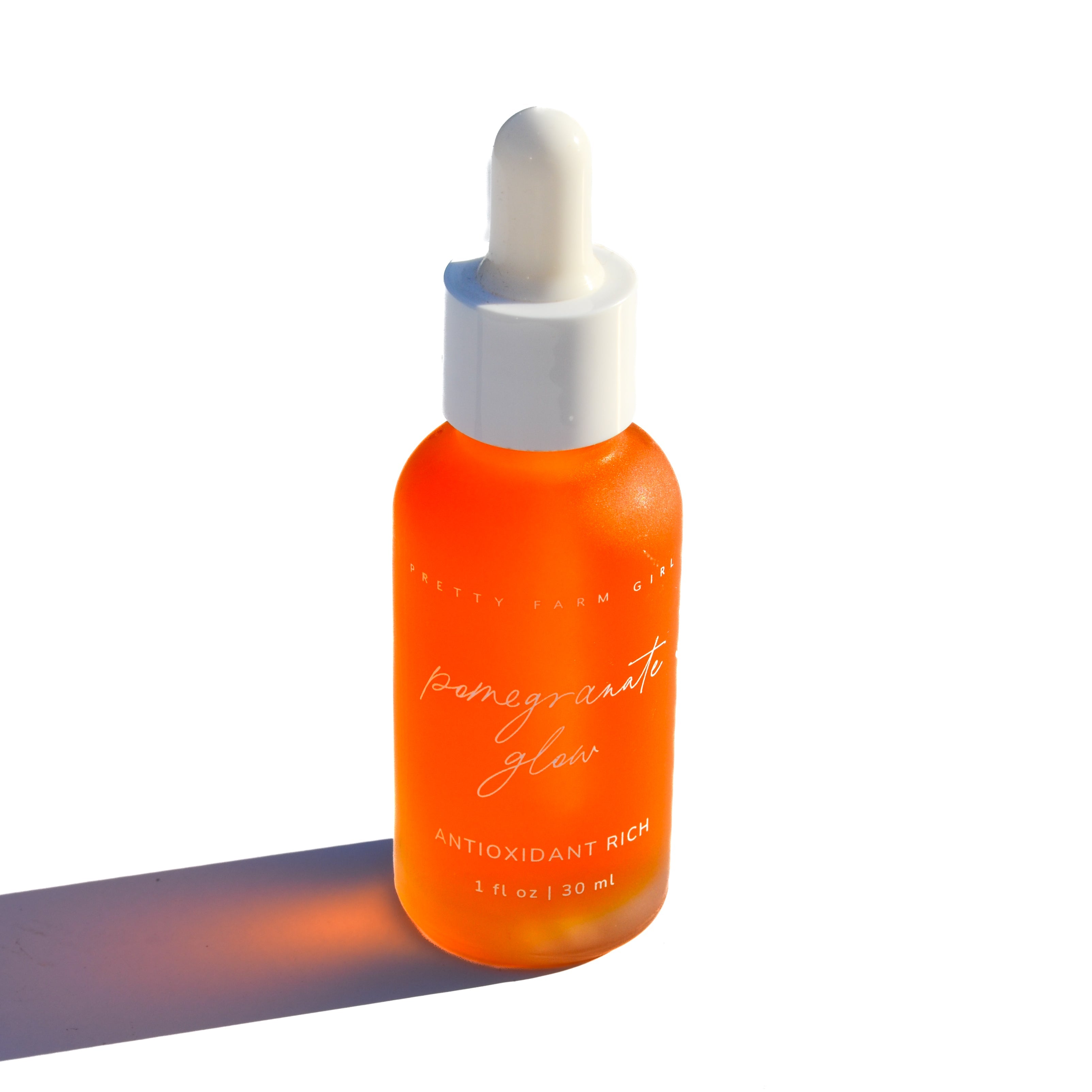 Pomegranate Glow Natural Skin Protecting Serum face serum with nature-inspired artwork - product view 4