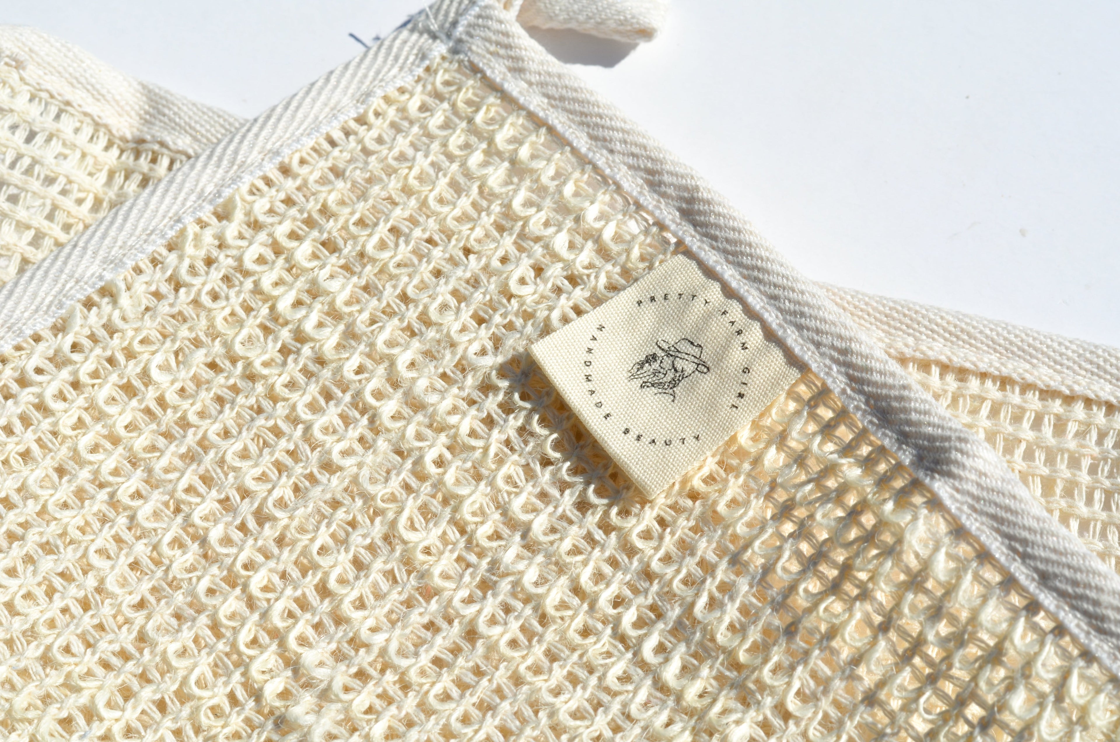 Sisal Exfoliating Wash Cloth uncategorized / needs cleanup with nature-inspired artwork - product view 2