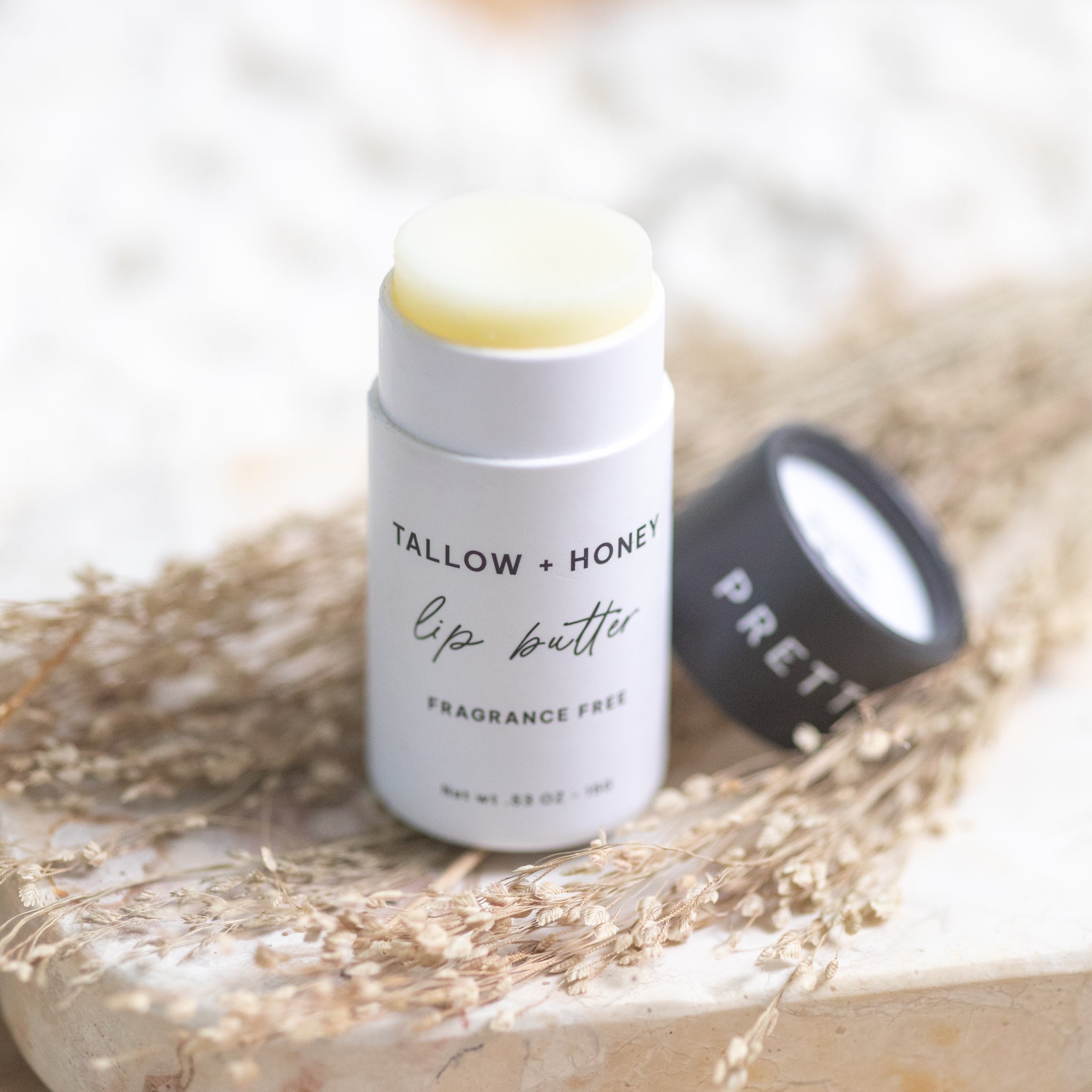 Fragrance Free Tallow + Honey Lip Butter in Eco lip butter with nature-inspired artwork