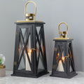 Set of 2 decorative candle lanterns with nature-inspired artwork