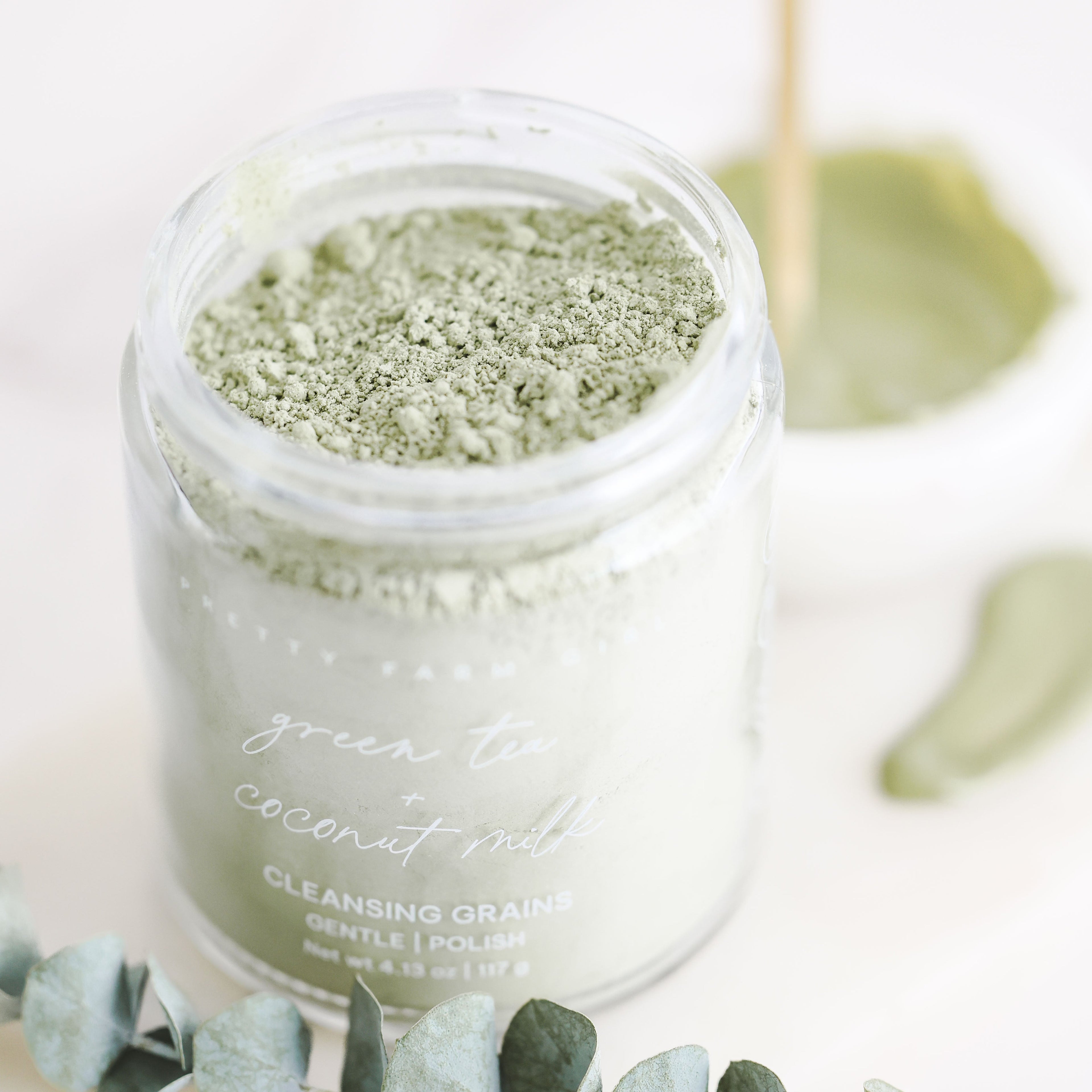 Green Tea + Coconut Milk Facial Cleansing Grains cleansing grains with nature-inspired artwork