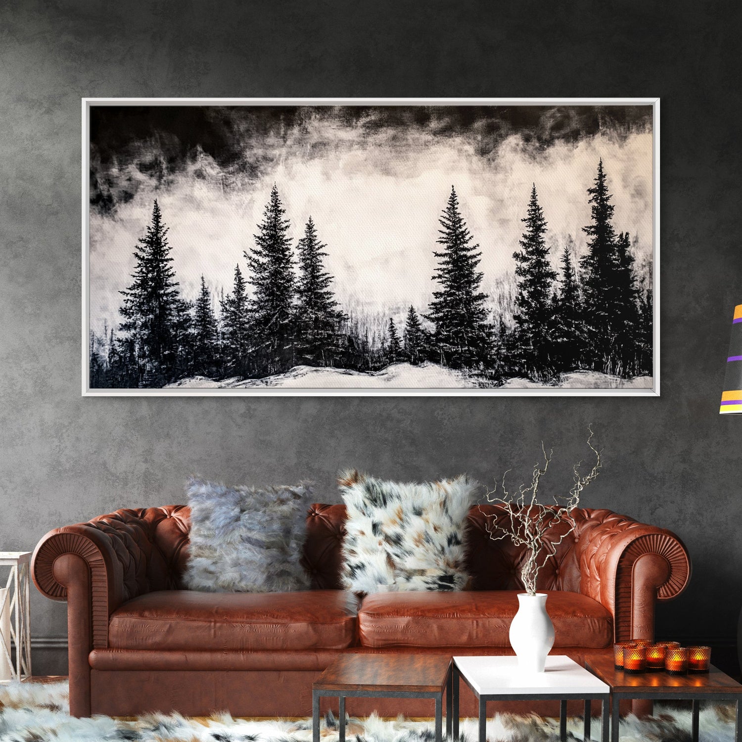 Living room with a brown sofa, decorative pillows, and a large forest painting on the wall.