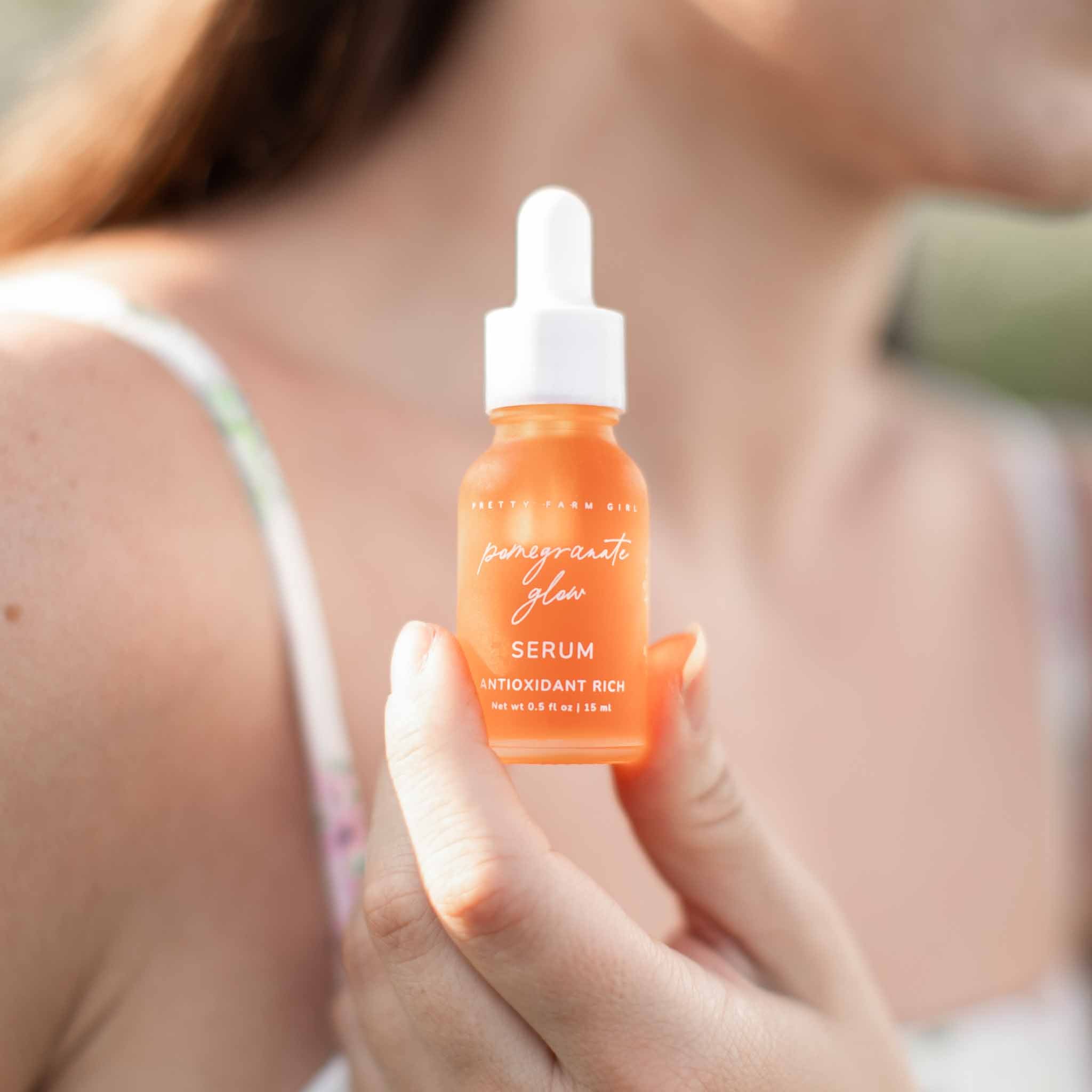 Pomegranate Glow Natural Skin Protecting Serum face serum with nature-inspired artwork