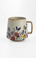 Blooming Butterfly ceramic mug with nature-inspired artwork