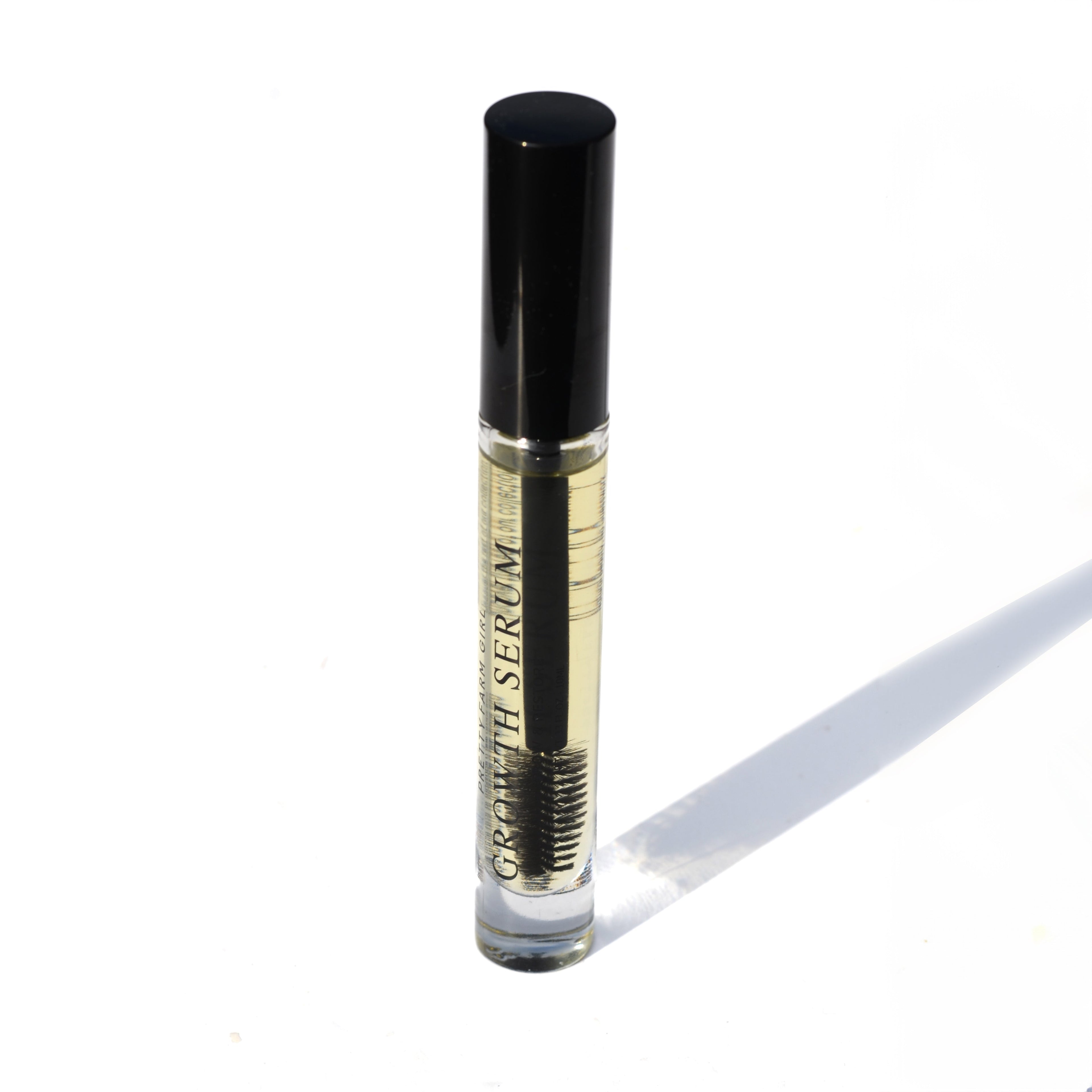 Eyelash + Eyebrow Growth Serum eyelash serum with nature-inspired artwork - product view 2
