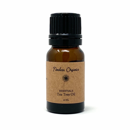 Bottle of Tea Tree Oil by Timeless Organics on a white background
