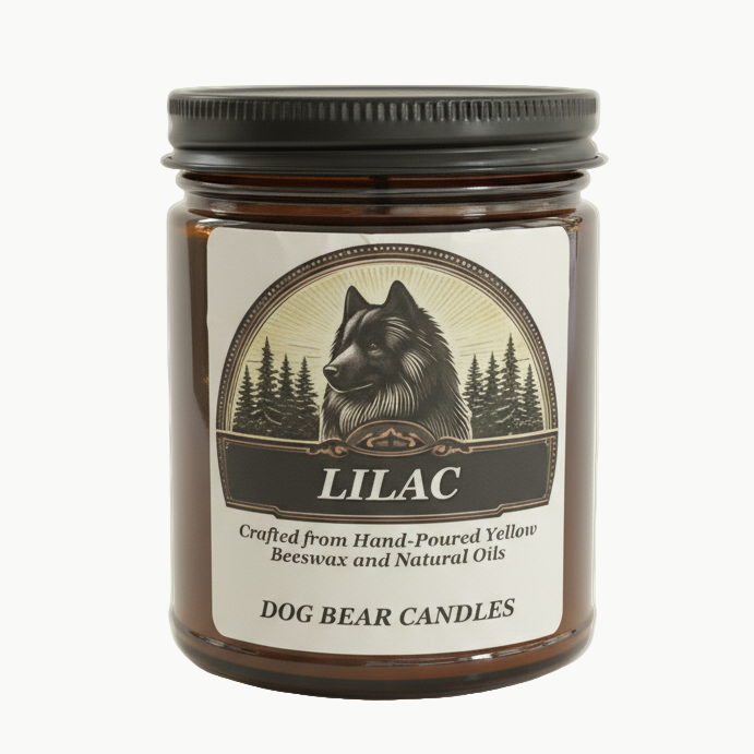 Lilac candle on cream background