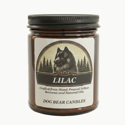 Lilac candle on cream background