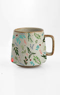 Festive Christmas Charm Stoneware ceramic mug with nature-inspired artwork