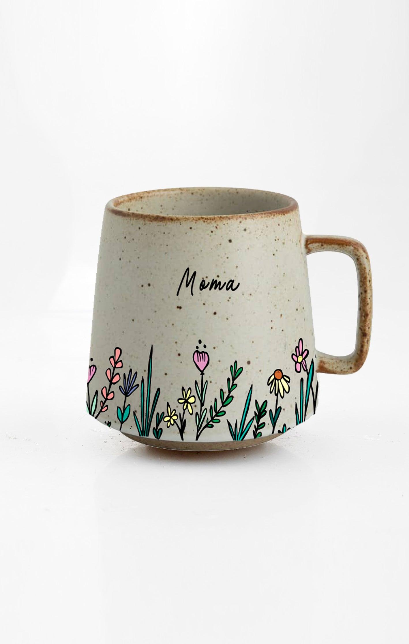 Mama Embrace ceramic mug with nature-inspired artwork